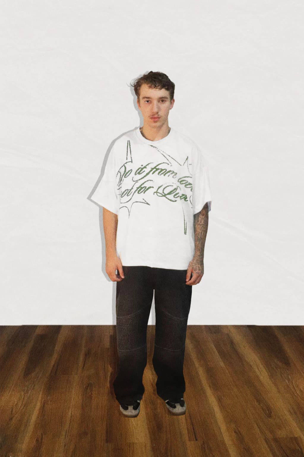 Model wearing green fern t-shirt